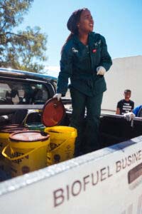 Hope Mapheto collects used cooking oil for her Biofuel business at a restuarant in Tompi Seleka College of Agriculture on16 April 2019